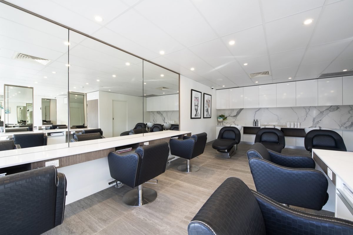 Styling stations inside Alkemi hair salon in Mount Pleasant