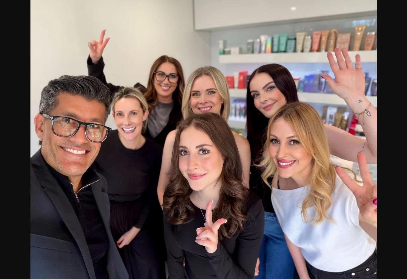 The Alkemi Salon team during an advanced cutting education session in Mount Pleasant.