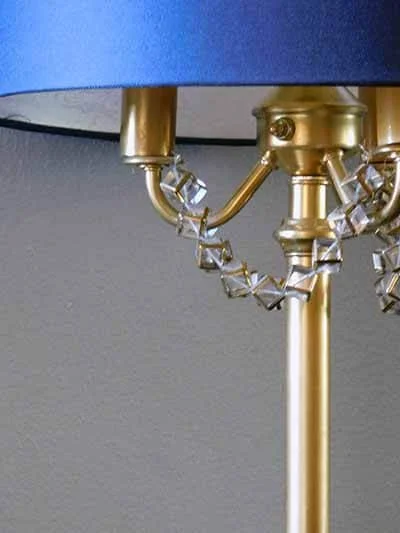 Revamp that ugly old lamp with spray paint and jewelry