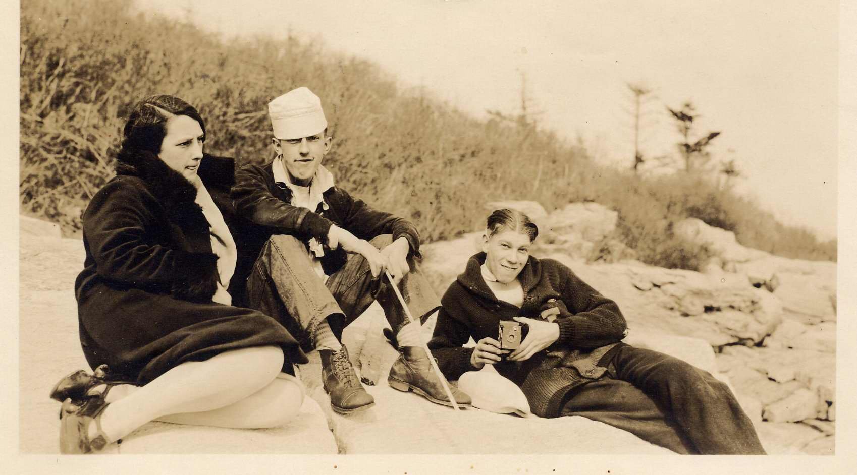 Marjorie and John Gomez with an unidentified man holding a camera. 1925–1929. Gift of Roberta Ricker. 2007.13.45