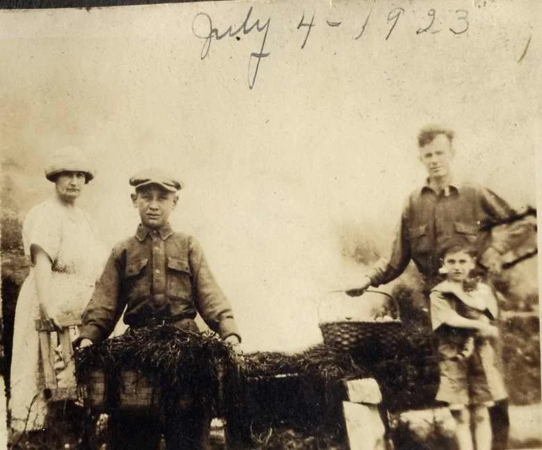Nettie and Warren Doughty (left) and David and Clyde Darling (holding a kitten) at the 4th of July clambake, July 4, 1923. From the Edith & David Darling Album. Gift of Laurie Wildes. 1999.44.29.B