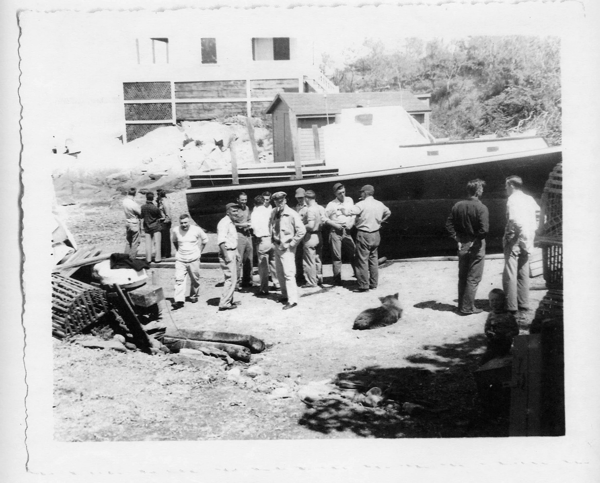 Ernie and Leon Horr’s lobsterboat brought into Old Cove for a new coat of paint after World War II, ca. 1946. Left to right: Donald Egan, Thomas MacVane, Jim Woodbury, George Anderson, Daniel Charles Train, Bob Train, Douglas Rich, Leon Horr, Wesley 