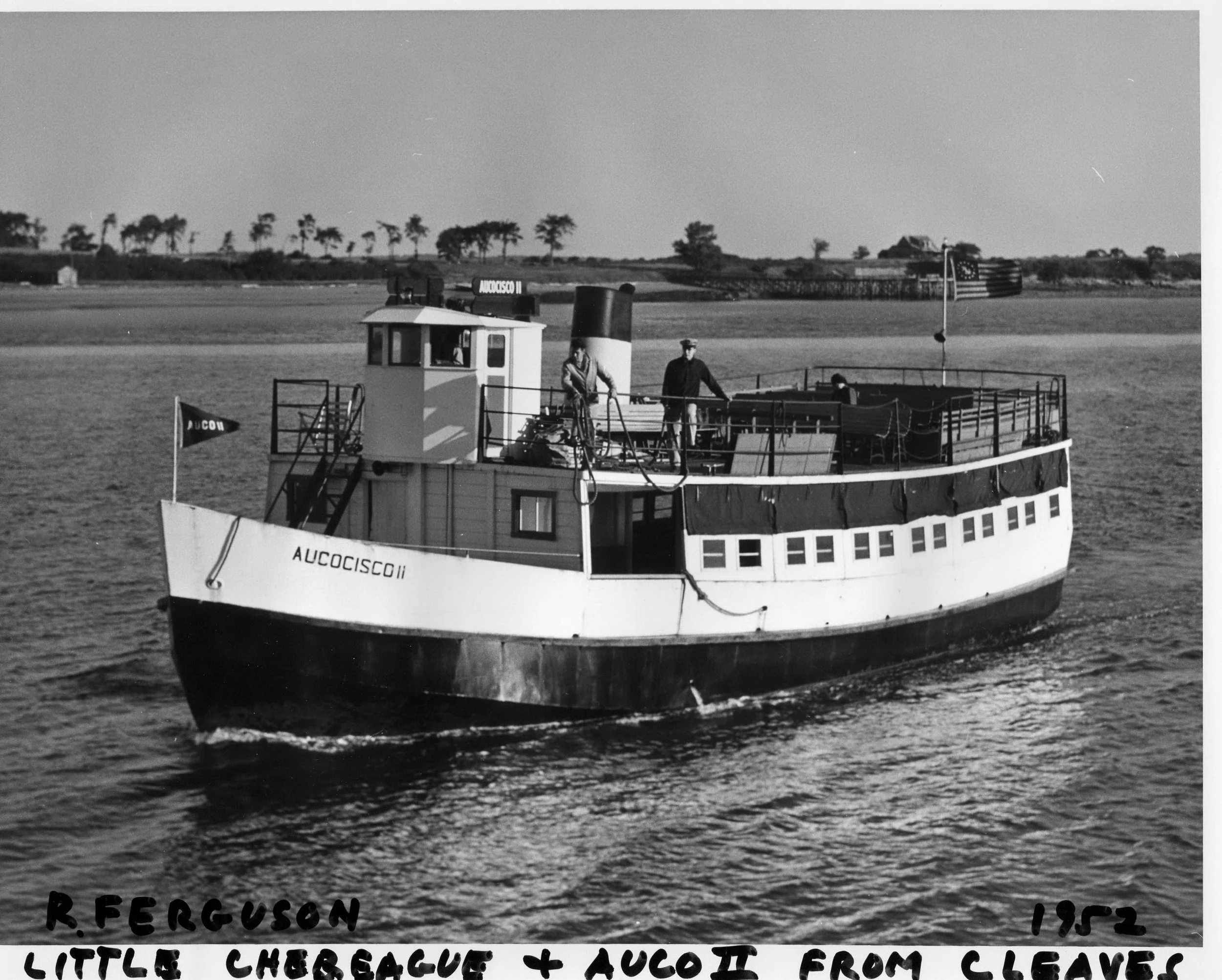 Ferry “Aucococisco II” with Little Chebeague Landing and World War II buildings on shore in the background. 1952. Gift of Roy Ferguson Jr. 1998.74.5