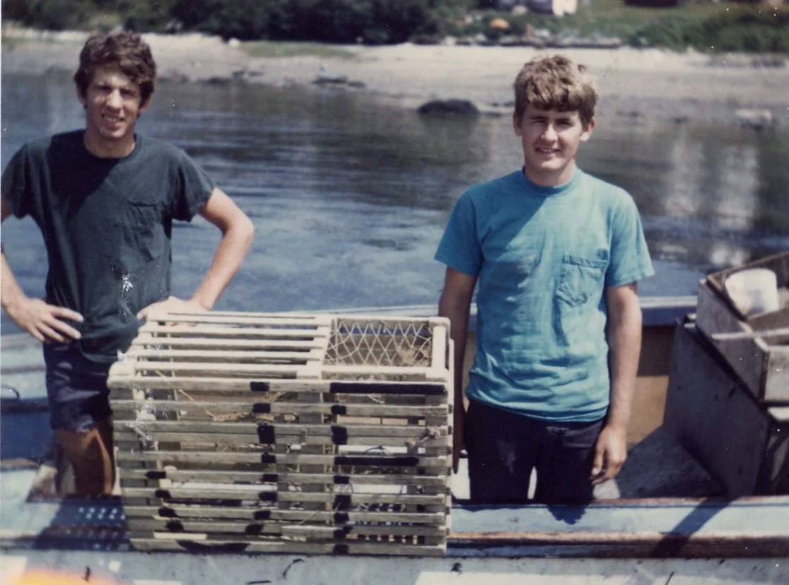 Stanley and Thomas H. MacVane with a square lobster trap. c. 1960. Gift of Donald MacVane. 2007.12.96