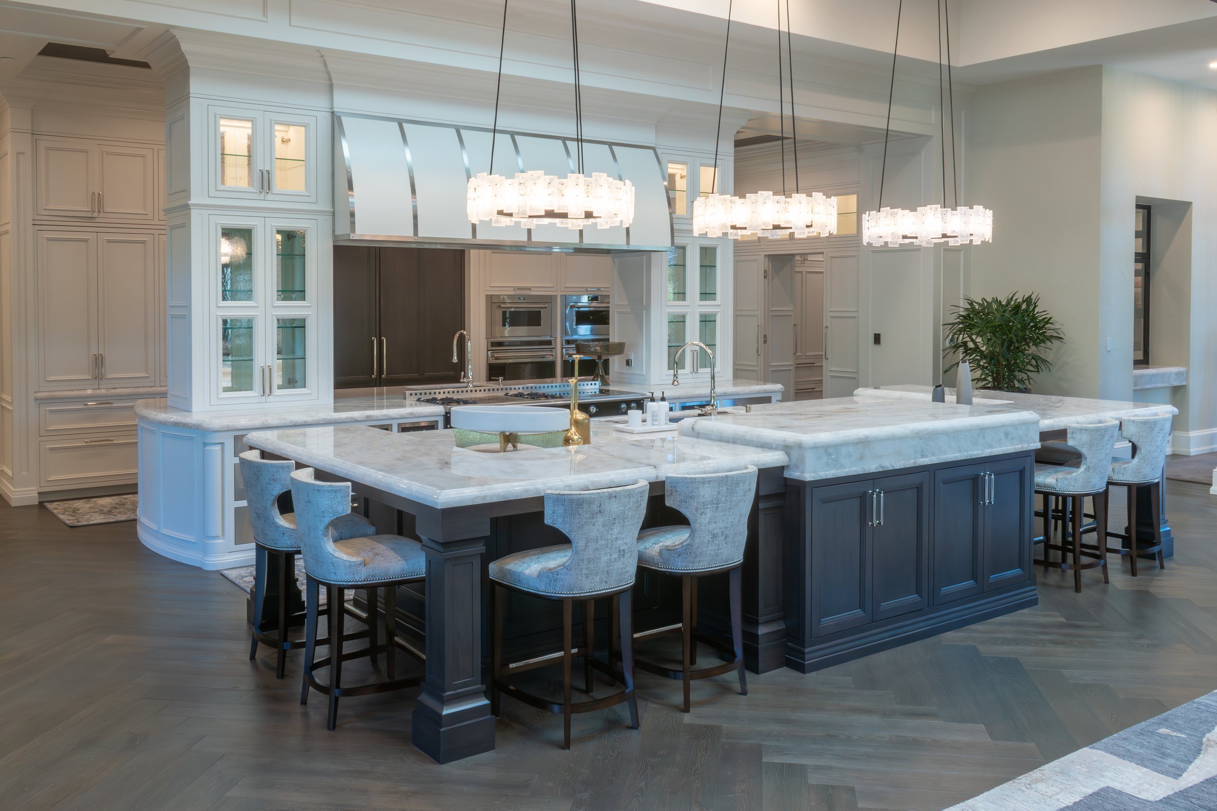 Two islands under crystal ring chandeliers