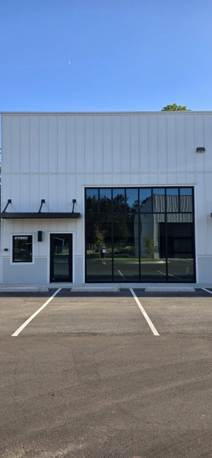 Full-height glass storefront configuration