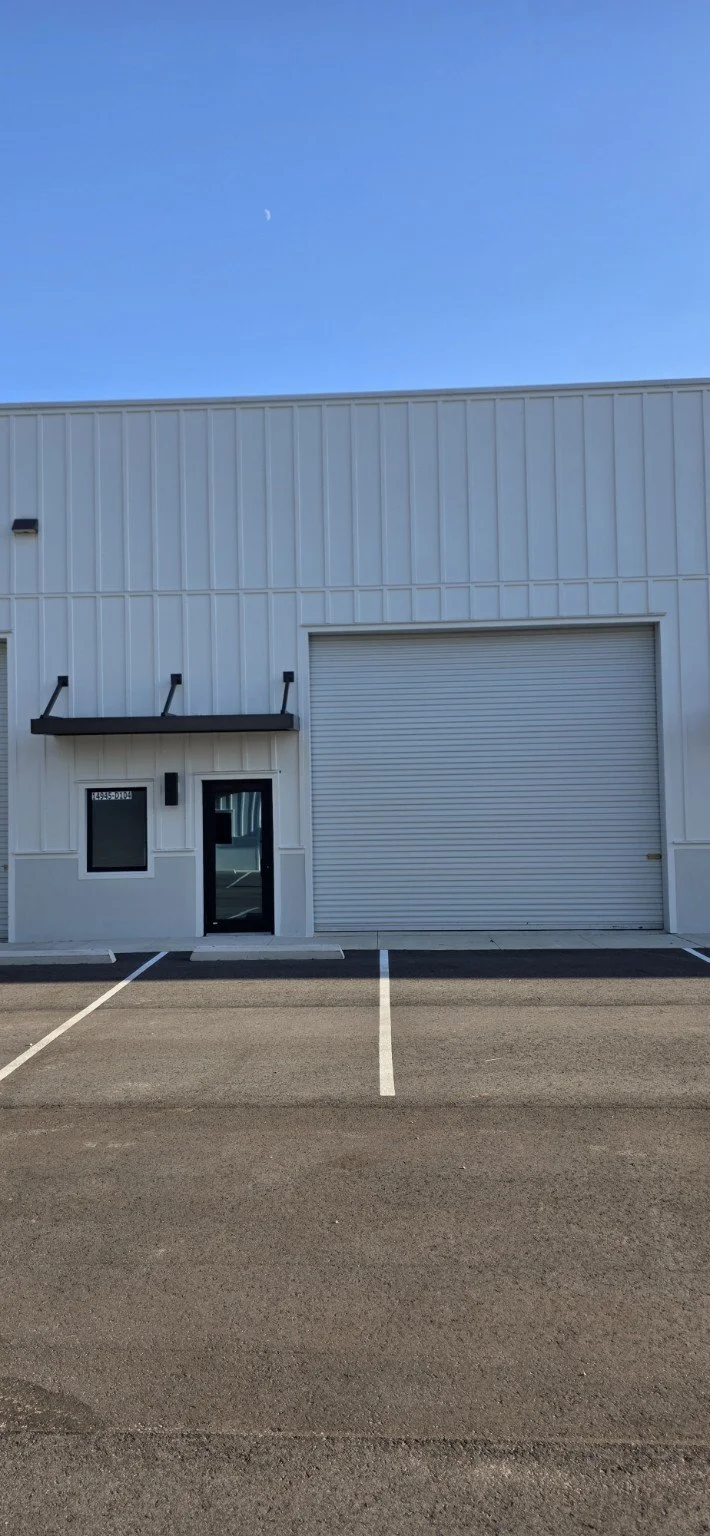 Personnel entrance with overhead warehouse door