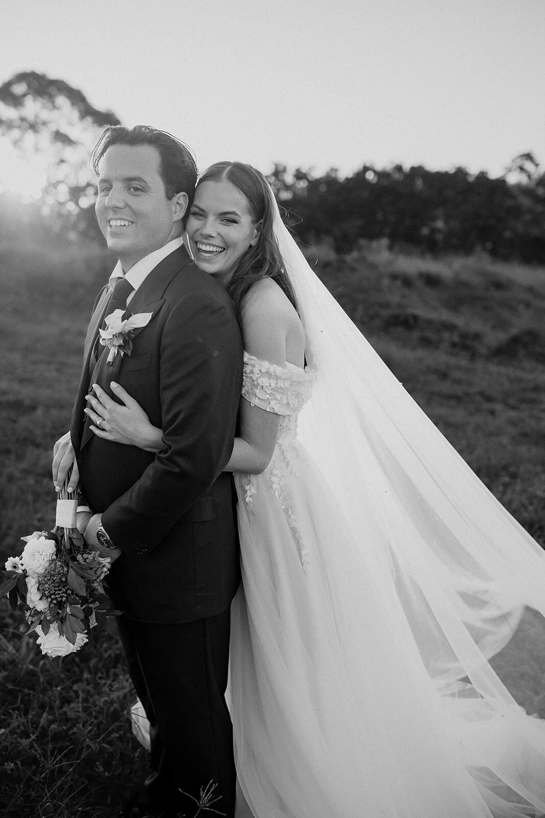 Black and white of the couple smiling, Steph and William's wedding at Earth House, Byron Bay