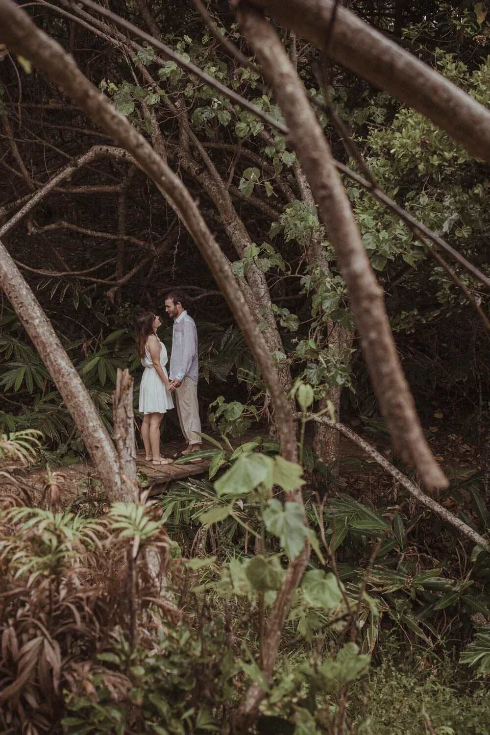 Couple in the rainforest, Yoanne and Elisa's rainy elopement at Broken Head, Byron Bay