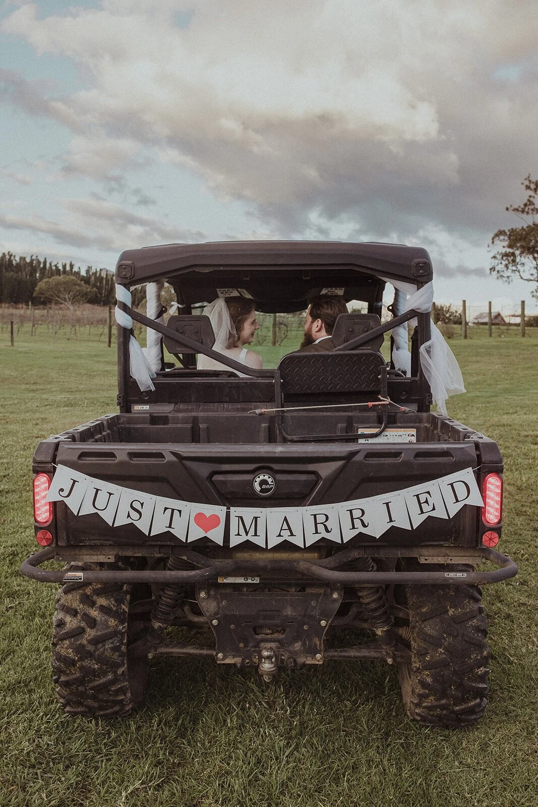 Just Married farm buggy with the couple inside, Sam and Tom's elopement at Highfield Farm, Northern Rivers