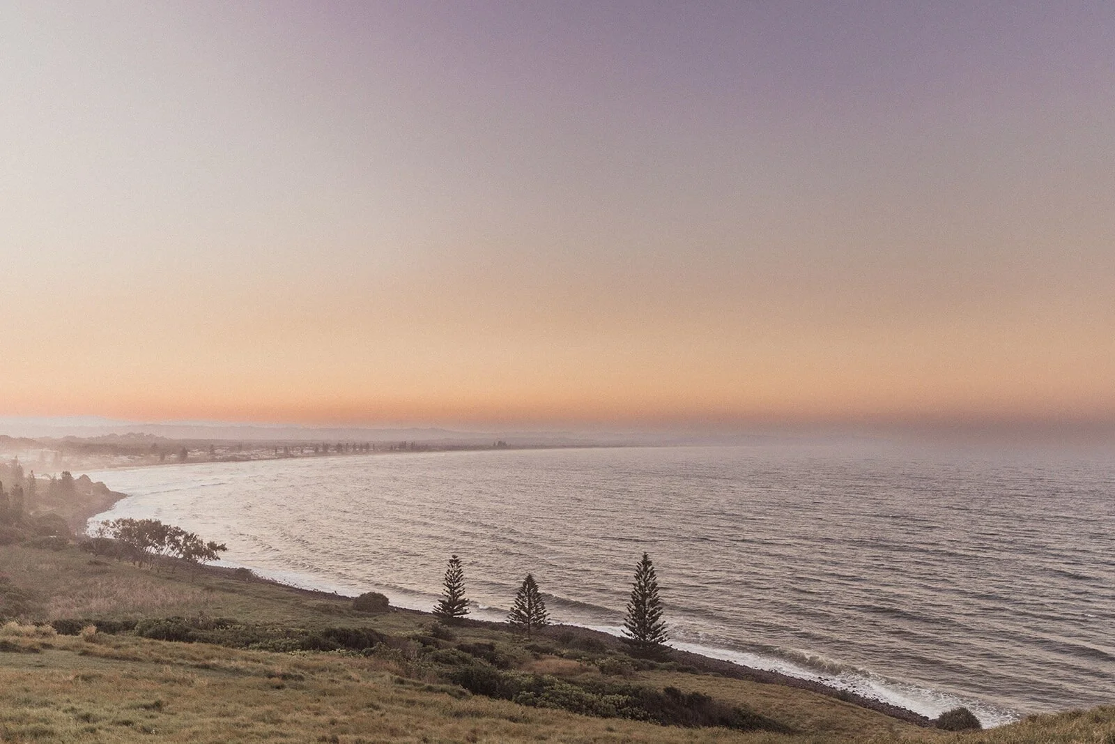 Headland and coastline at sunset, Maritess and Mark's elopement at Lennox Head