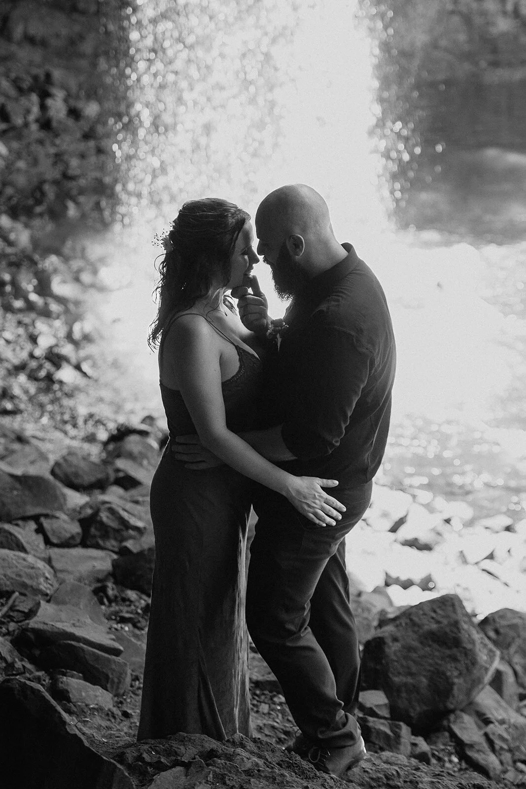 Black and white of the couple embracing, Sara and Graeme's elopement at Killen Falls, Northern Rivers