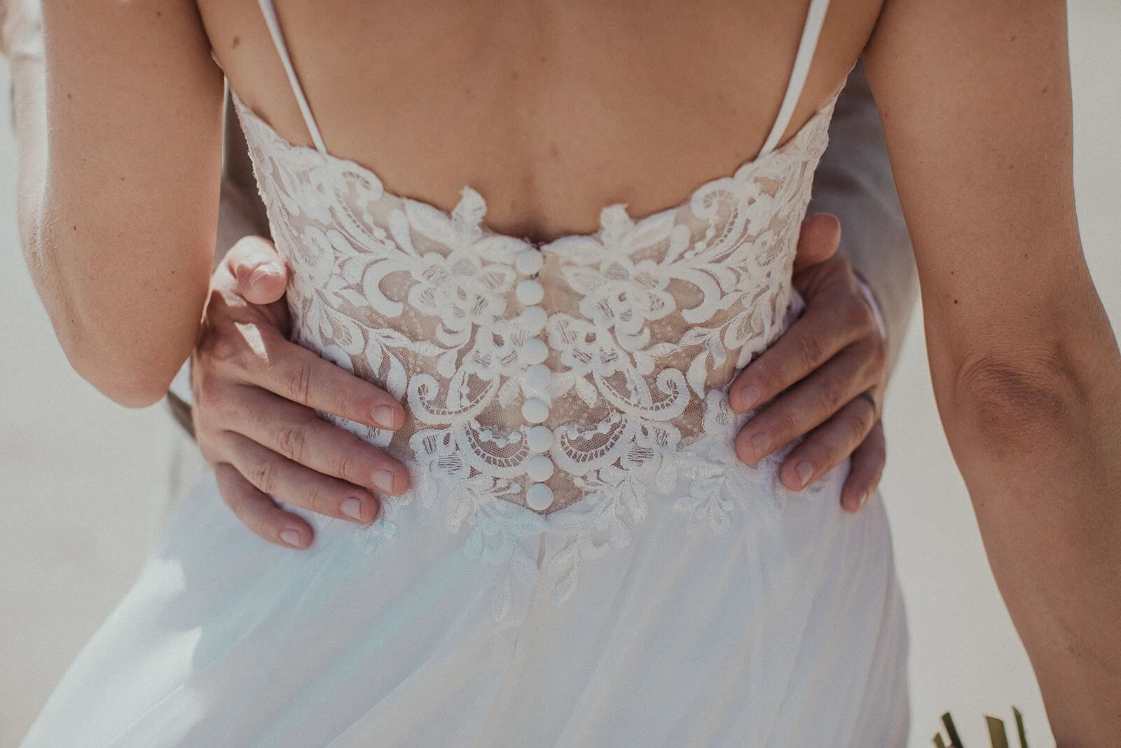 Detail of the lace back of the wedding dress, Eliza and Greg's elopement at Broken Head, Byron Bay