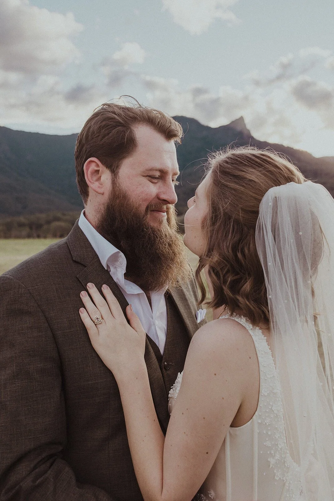 Close portrait of the couple embracing, Sam and Tom's elopement at Highfield Farm, Northern Rivers
