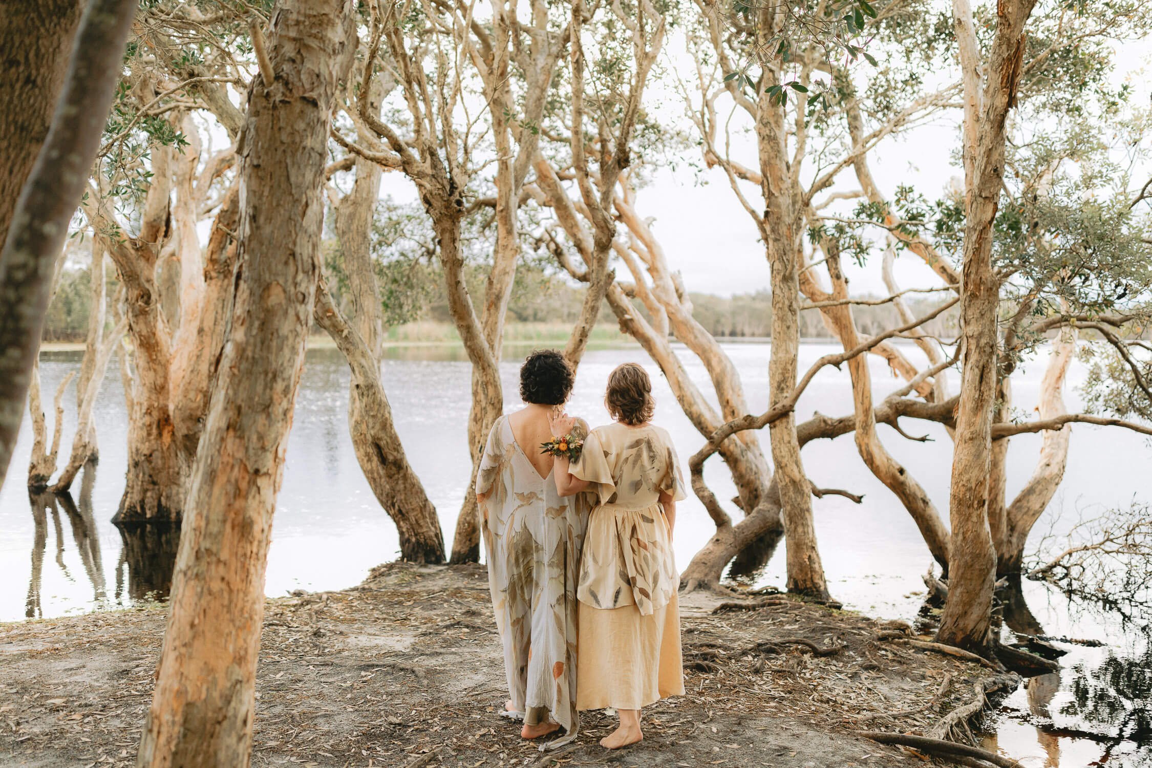 Two brides among paperbark trees at Lennox Head, north of Byron Bay