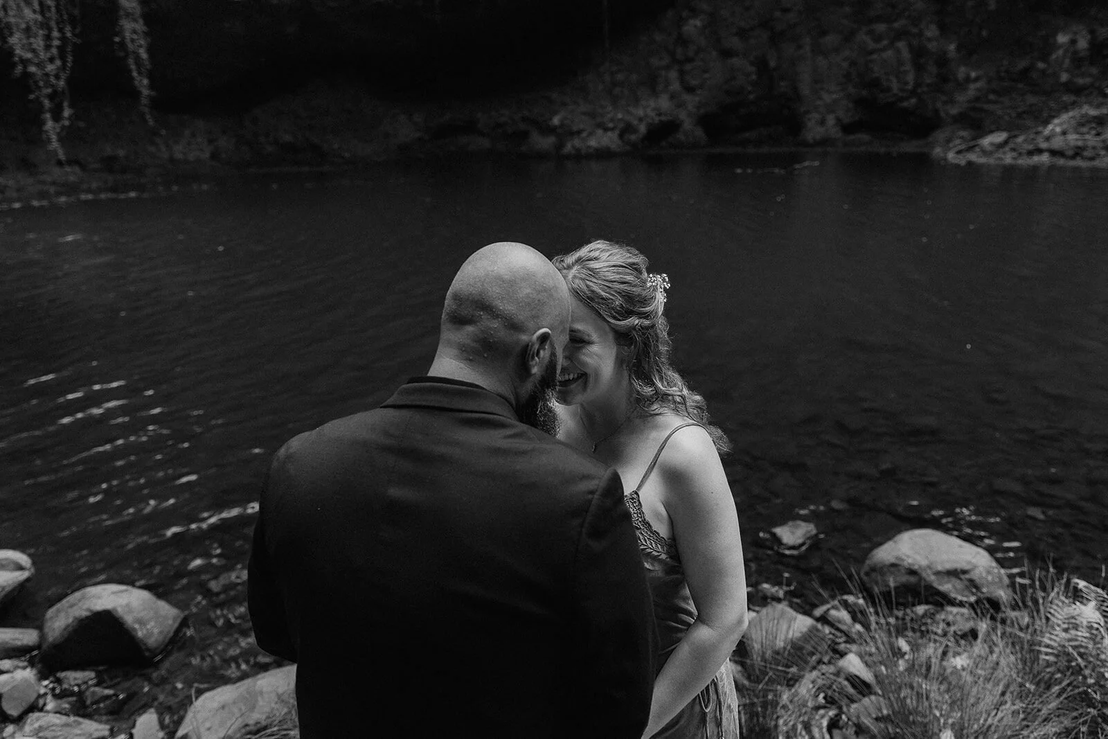 Black and white of the couple pressing foreheads together, Sara and Graeme's elopement at Killen Falls, Northern Rivers