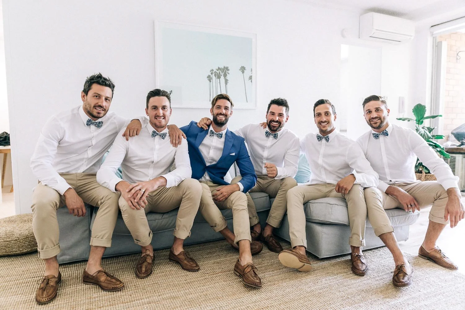 Groom and groomsmen relaxing before the ceremony at a Bilgola Beach wedding