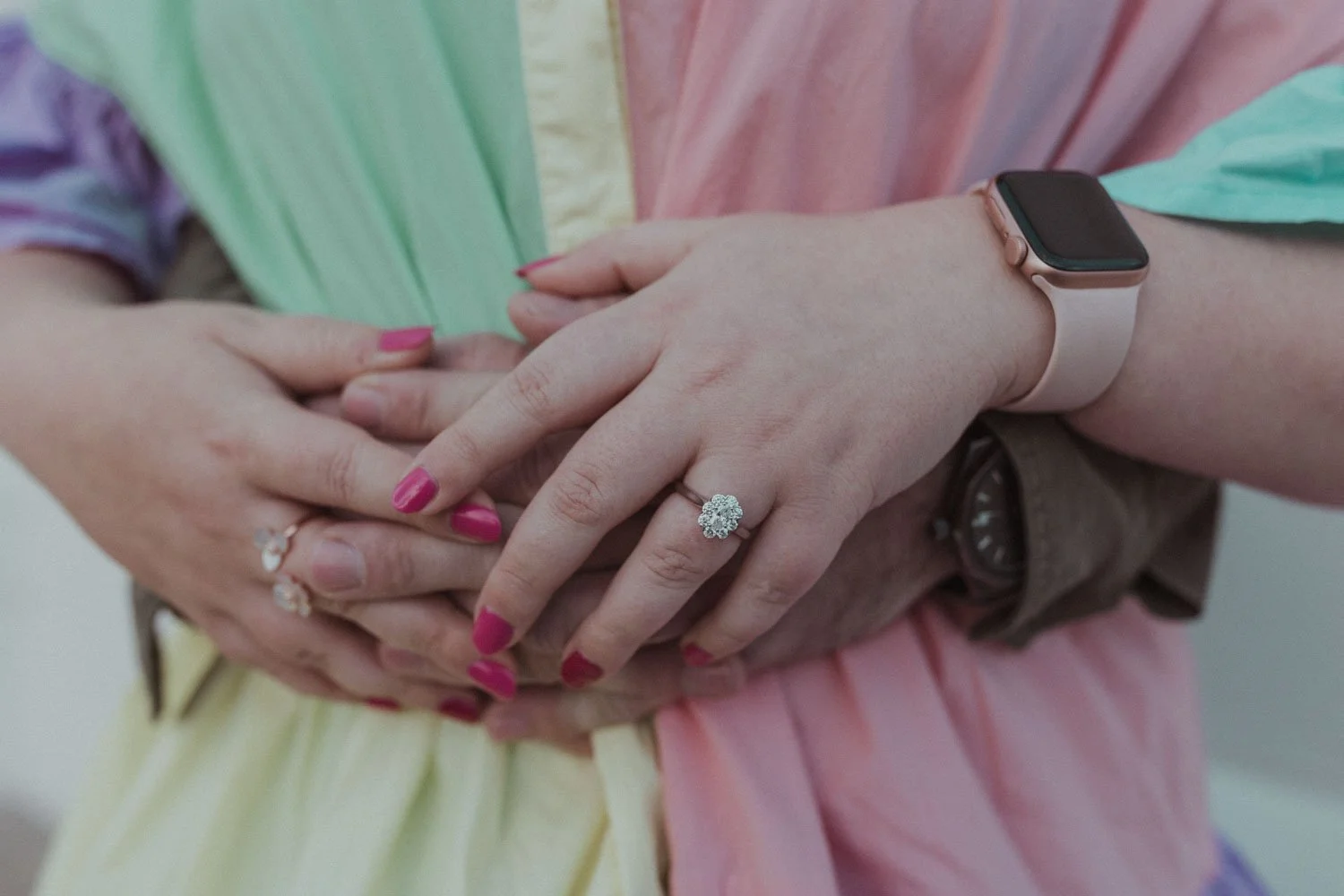 Close-up of the engagement ring as the couple hold hands at the Byron Bay lighthouse