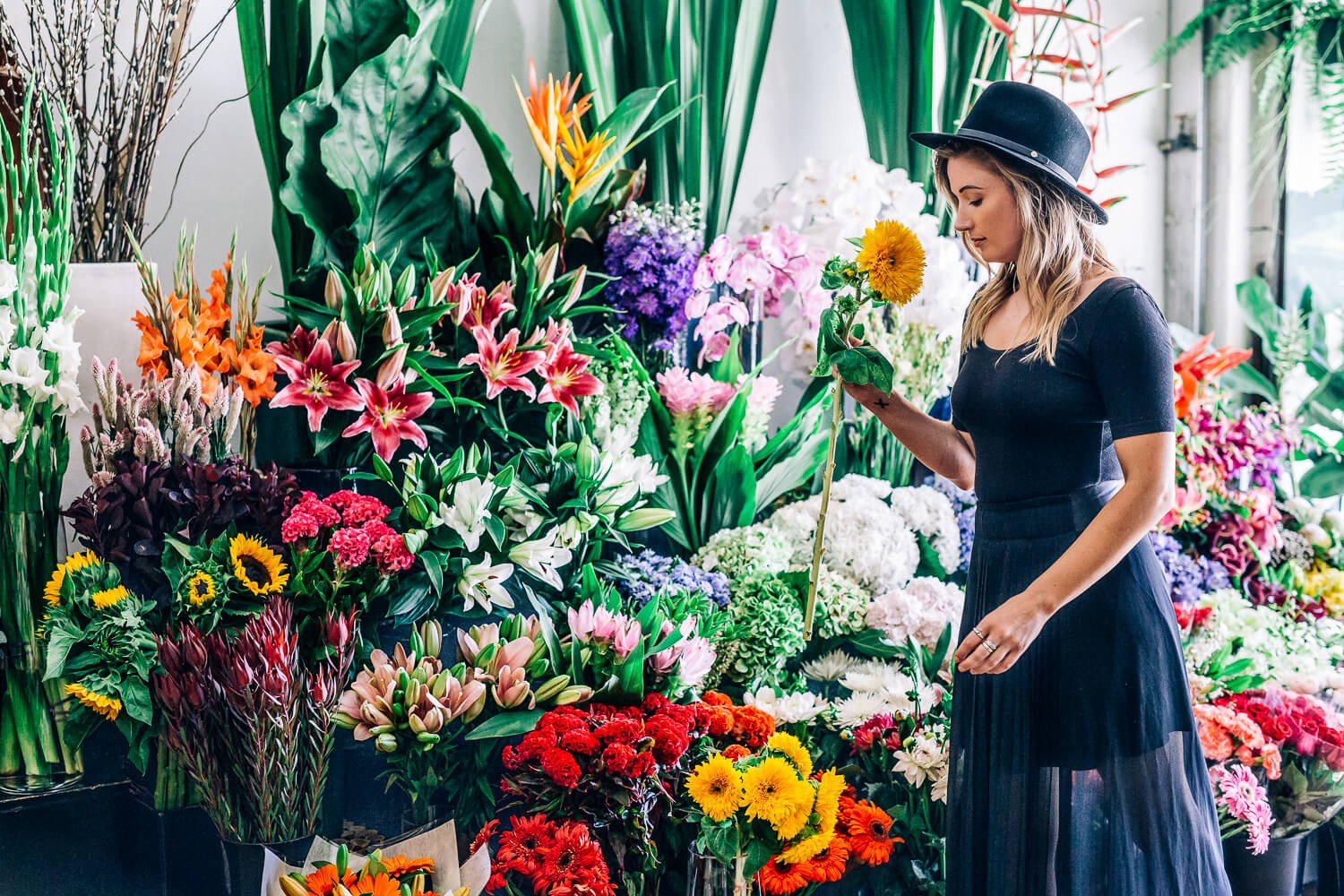 Lifestyle brand shoot for Ellebeo among florist’s buckets in Bondi