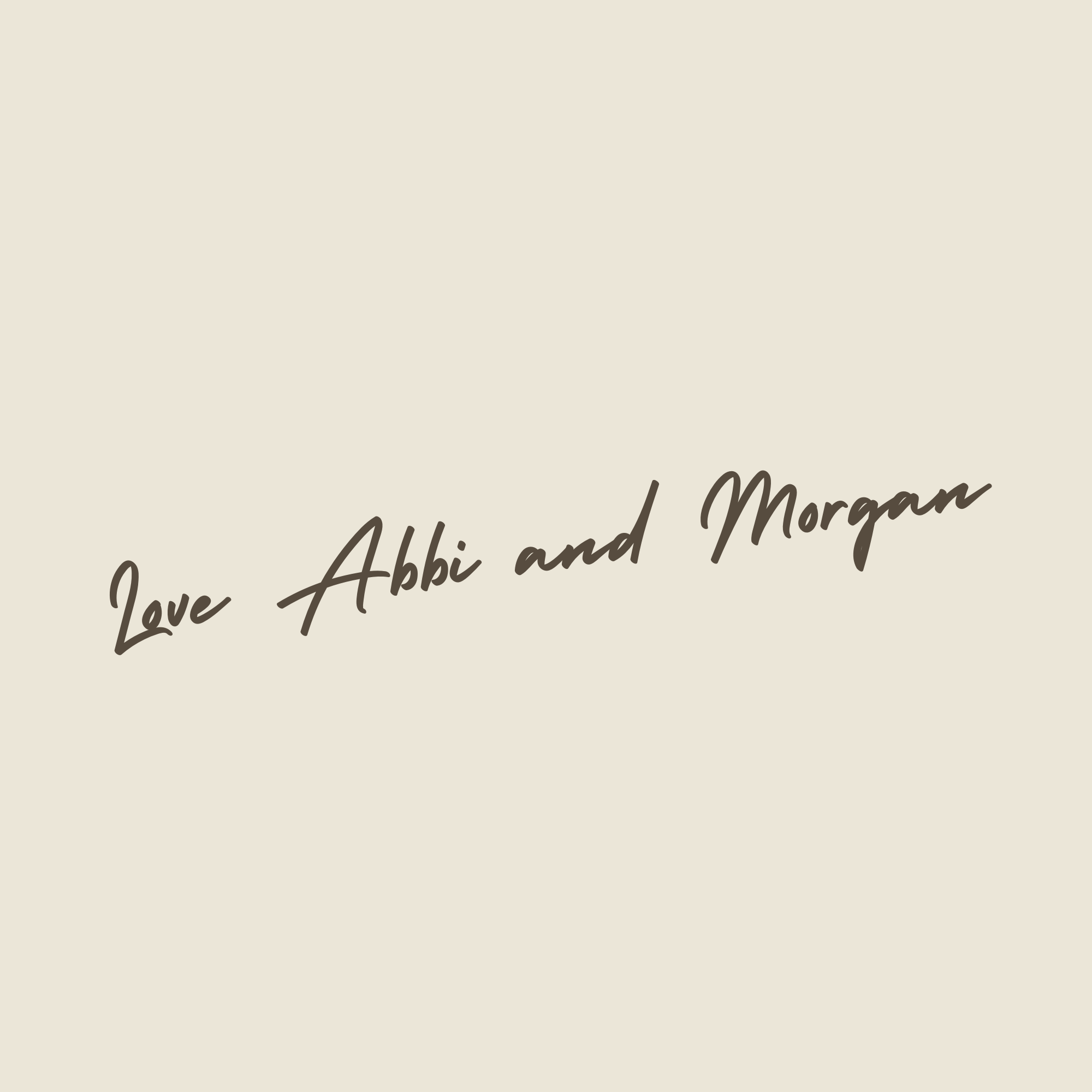 Close-up of a cream-colored background with handwritten text in dark brown that says 'Love Abi and Morgan'.