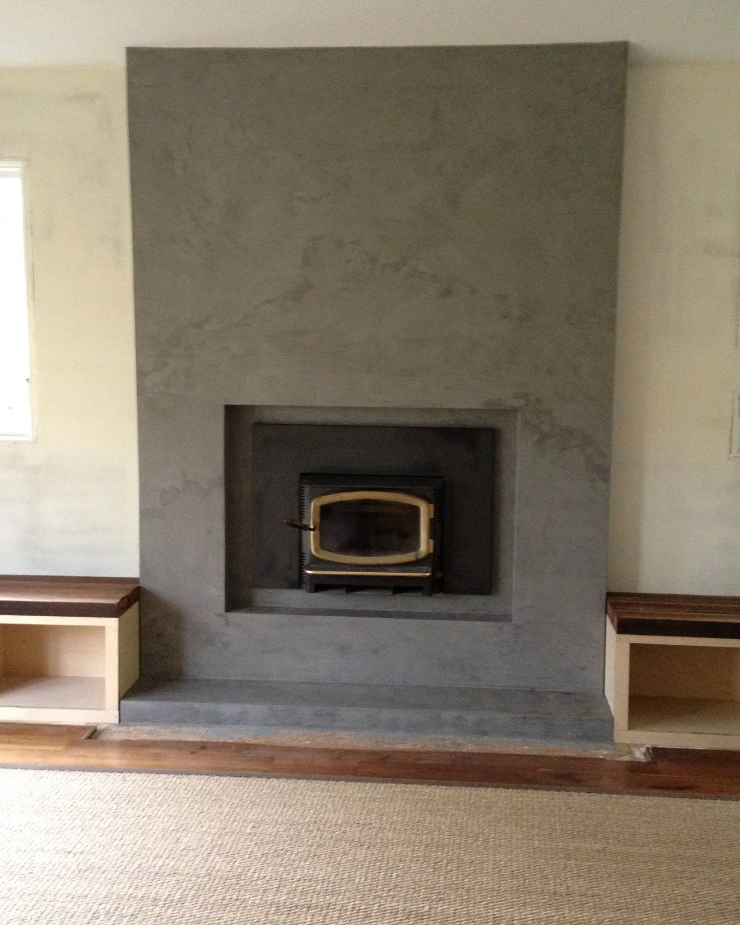 Bayly Builds project: decorative concrete fireplace and benches