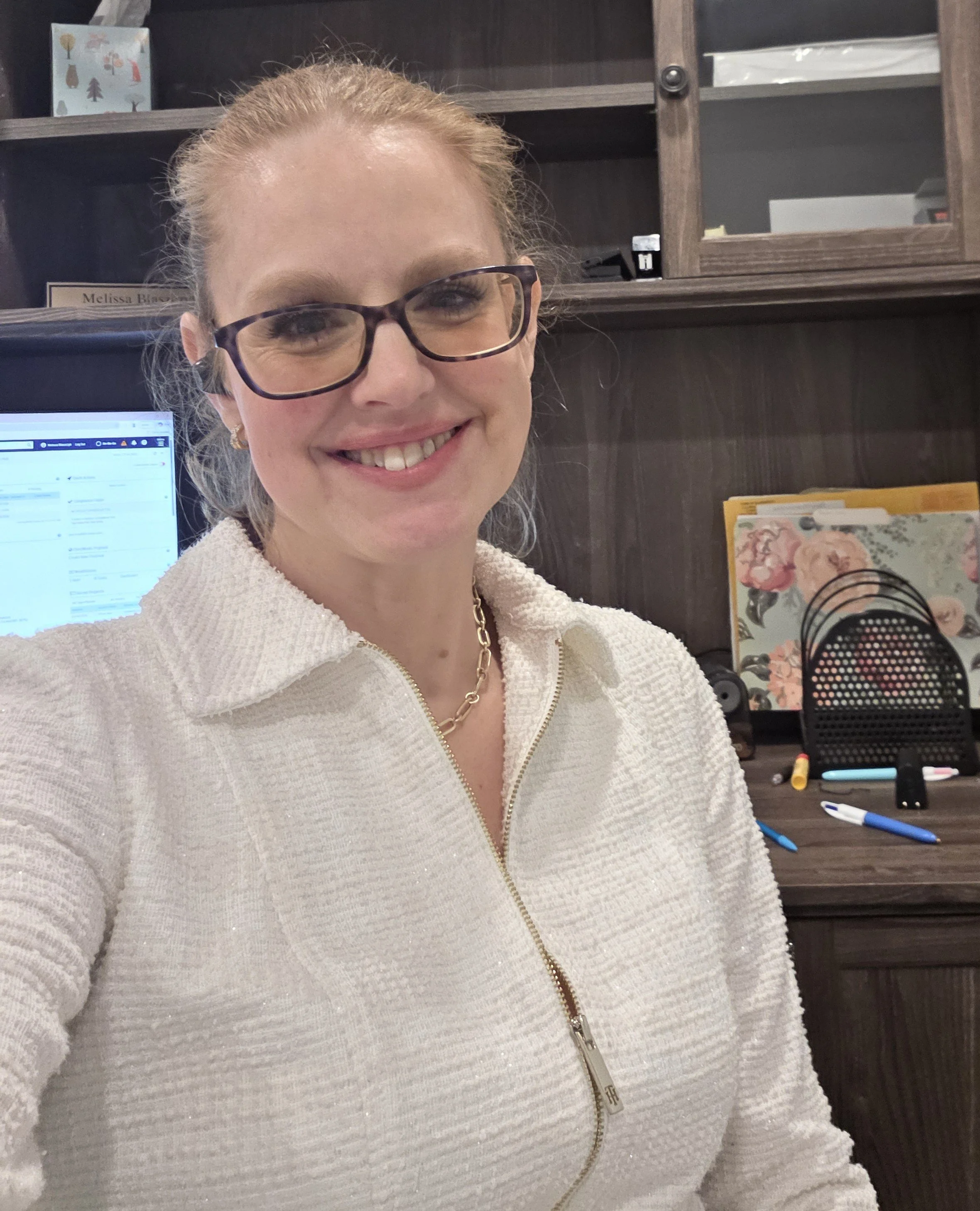 Melissa Blaszczyk working in her West Nyack office