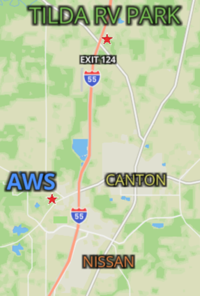 Map showing a section of Interstate 55 with exits and nearby landmarks including Tilda RV Park at exit 124, AWS, Canton, and Nissan.