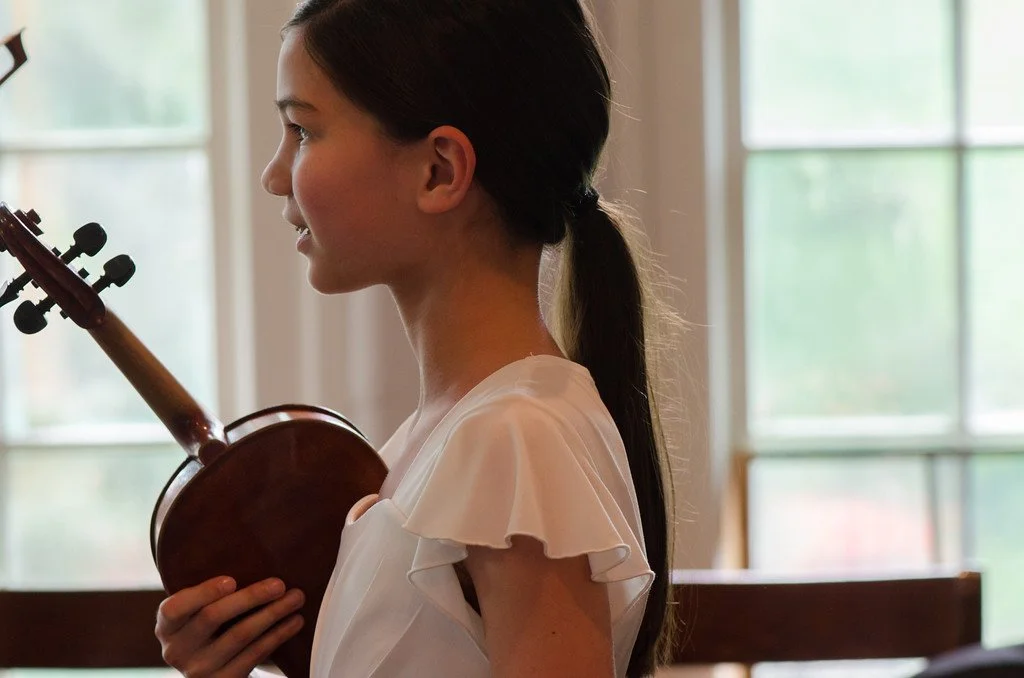 Student holding a violin