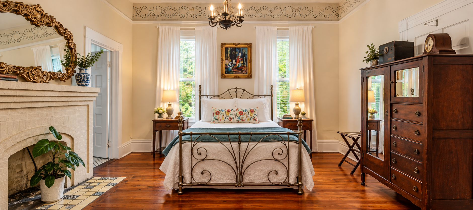 The Holberg Room, Historic guest room at The Veranda Historic Inn in Senoia, GA, featuring historic character, fireplace and vintage furnishings.