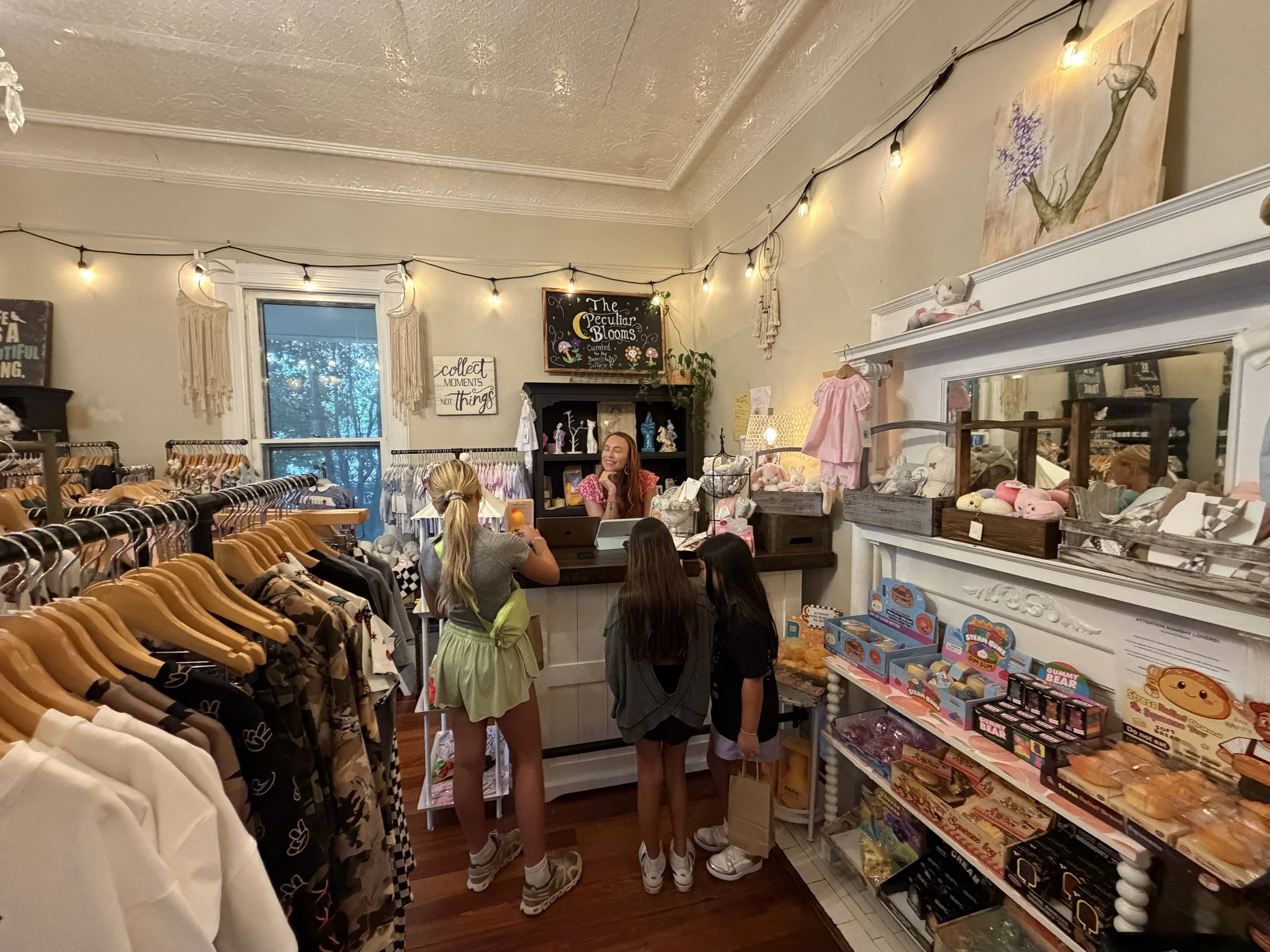 Children's clothing, toys and gifts inside The Peculiar Blooms boutique at The Veranda Historic Inn in Senoia, GA.
