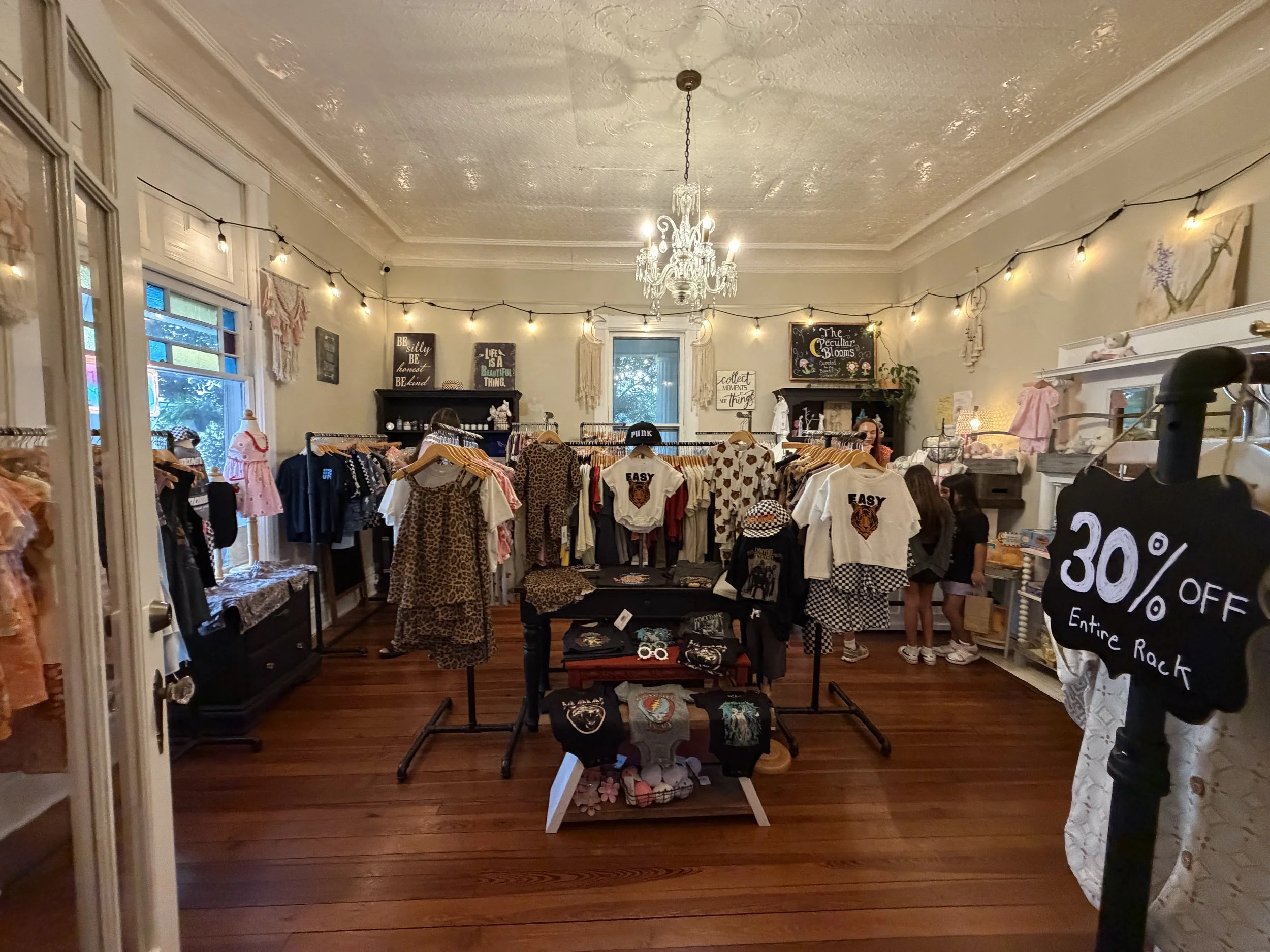 Boutique shopping inside The Veranda Historic Inn in Senoia, GA, featuring clothing, gifts and unique finds.