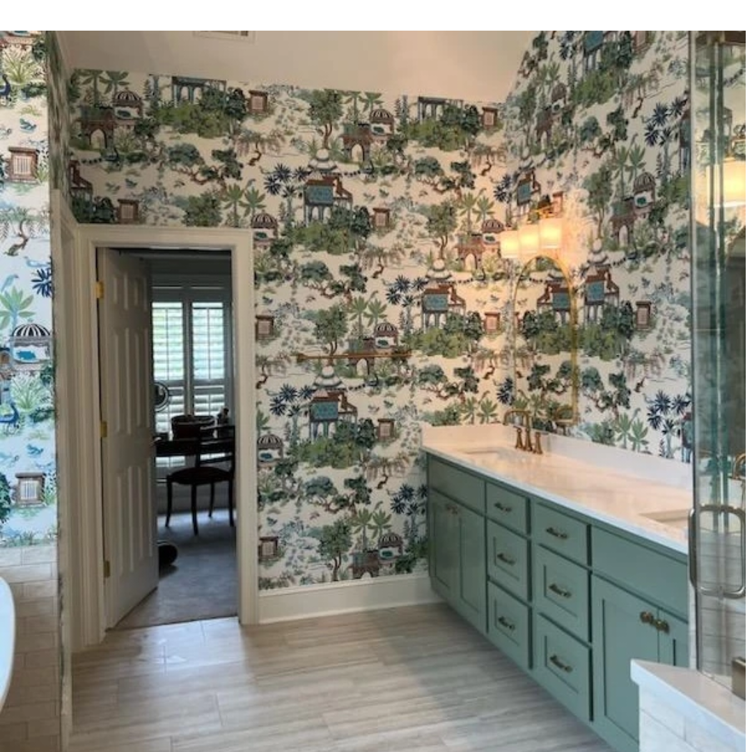 Bathroom with green toile landscape wallpaper and a sage green double vanity designed by Bonnie Boyette Designs