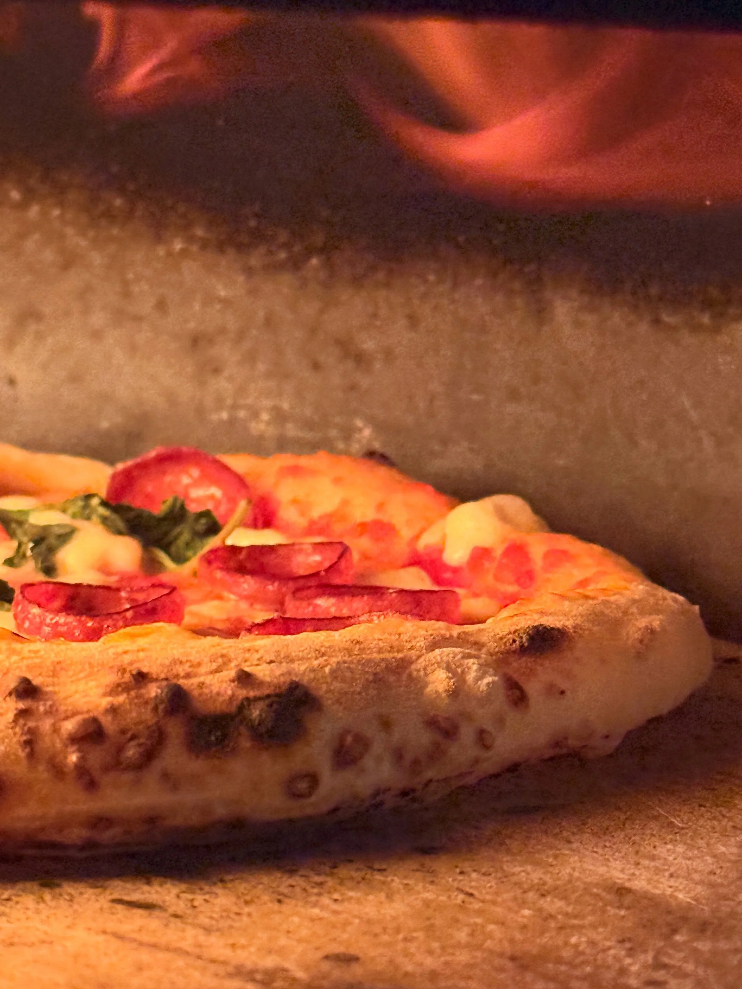 I always tell myself I&rsquo;m going to take more photos during our events, but honestly? The second that oven heats up to when the last flame goes out, I am thinking of nothing but the pizza. My head is in the game. 🔥
But tonight, right in the midd