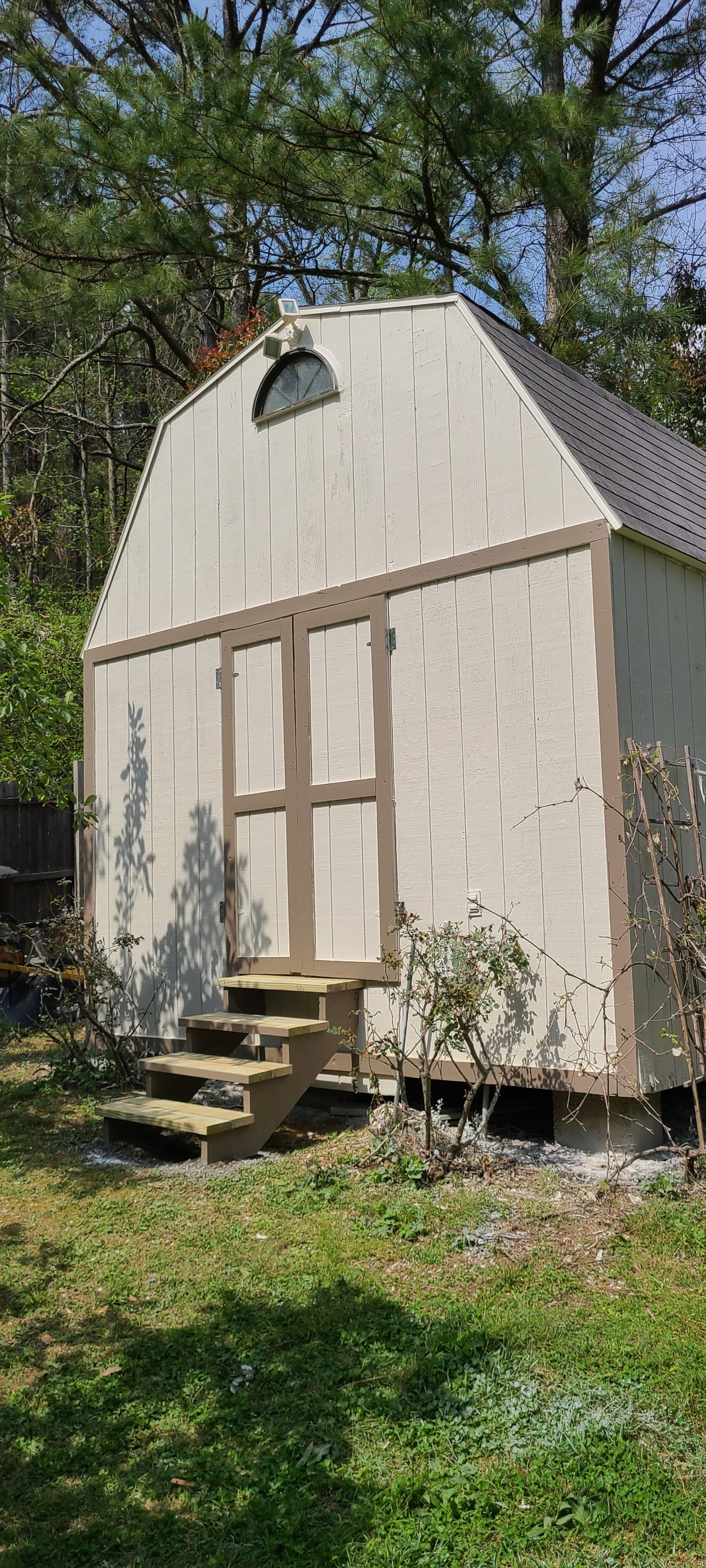 Painting a shed in Grant, Alabama