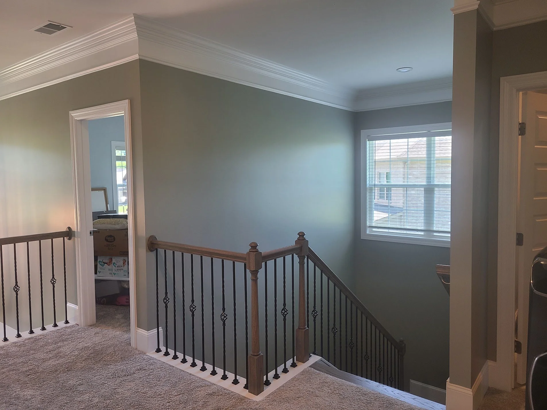 Interior painting project that included painting the upstairs landing and stairwell in Owens Cross Roads, Alabama.