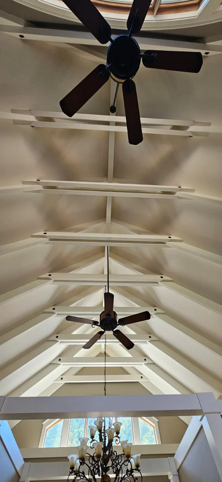 After: An interior painting project that included painting cathedral ceilings and beams in Union Grove, Alabama.