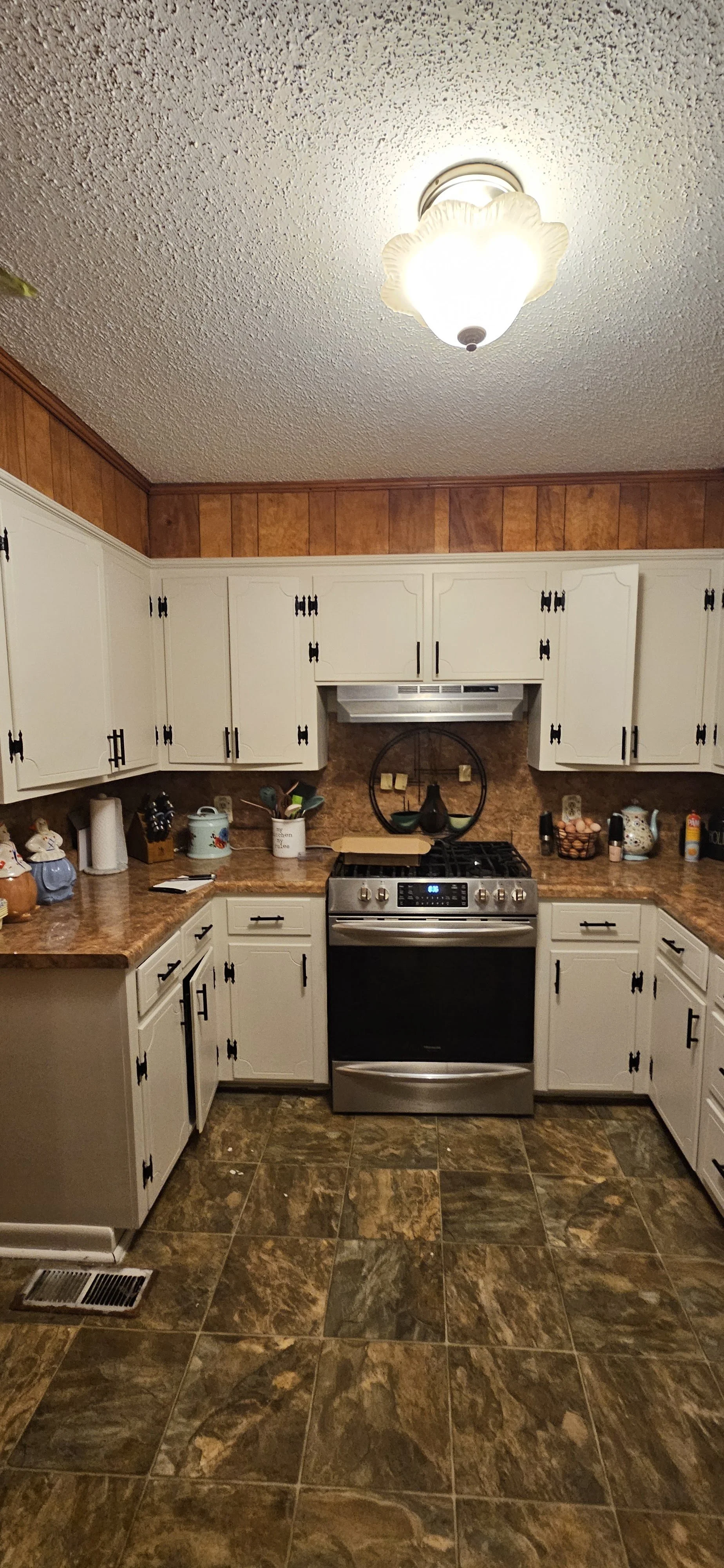 After: Kitchen Cabinets painted white in Boaz, Alabama.