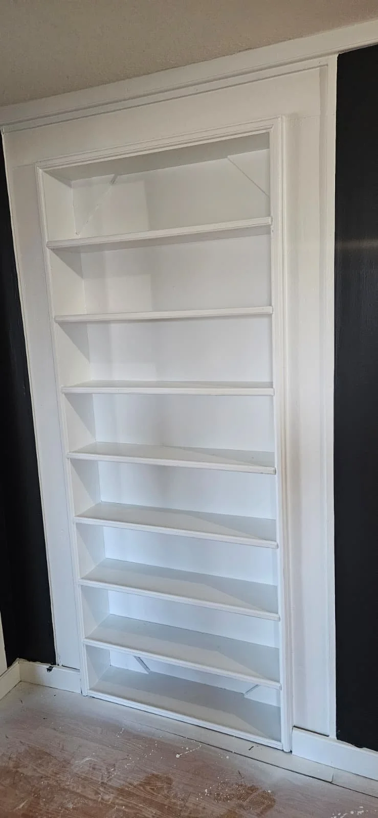 Built-In Shelves that were painted white in Huntsville, Alabama.