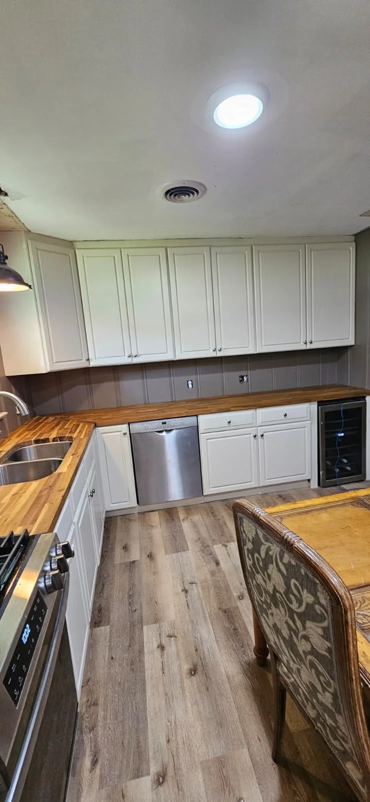Kitchen Cabinets painted white in Arab, Alabama.