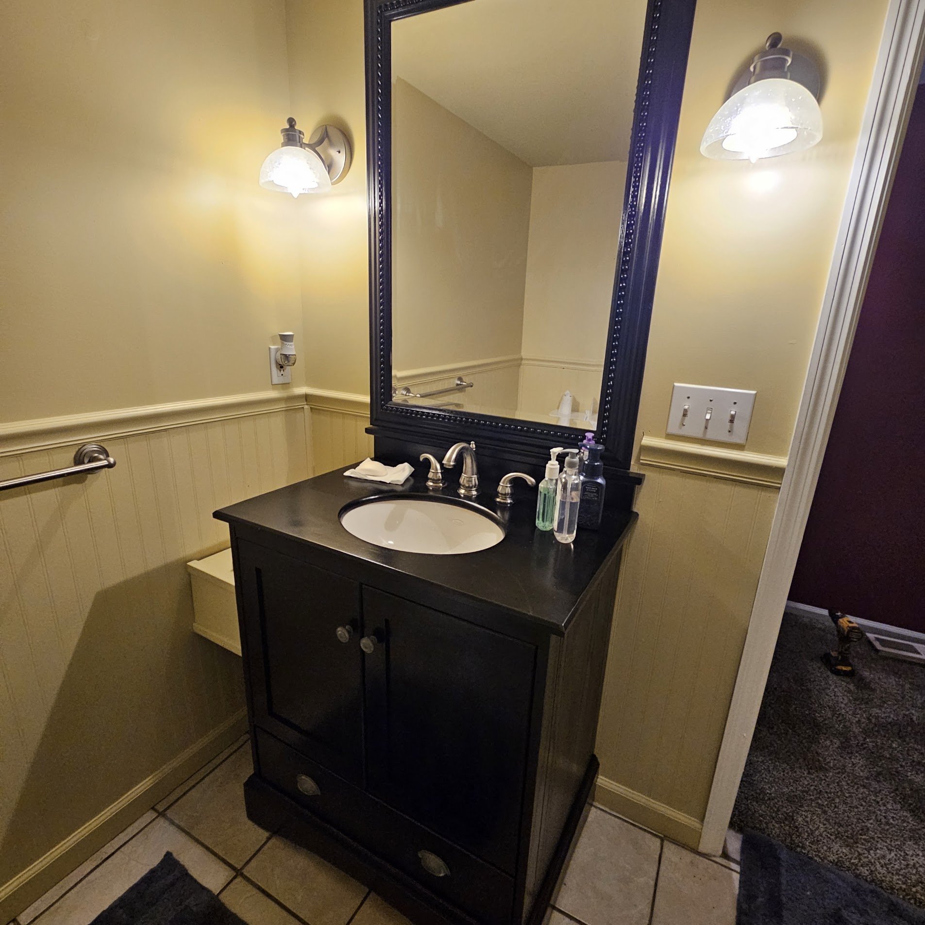 Bathroom walls, trim, and vanity base painted in Huntsville, Alabama.