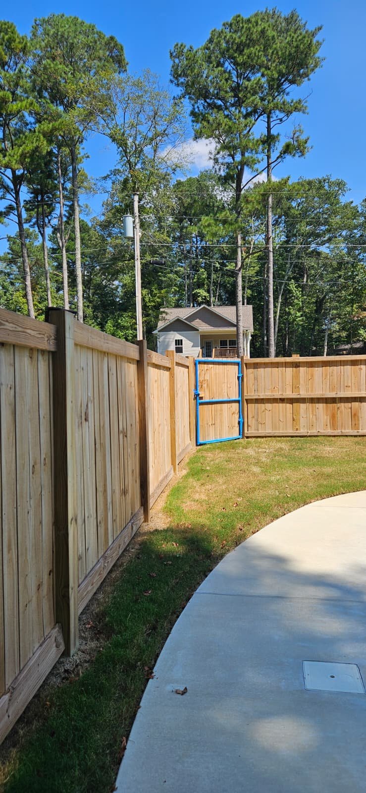 Before: Fence staining in Arab, Alabama.