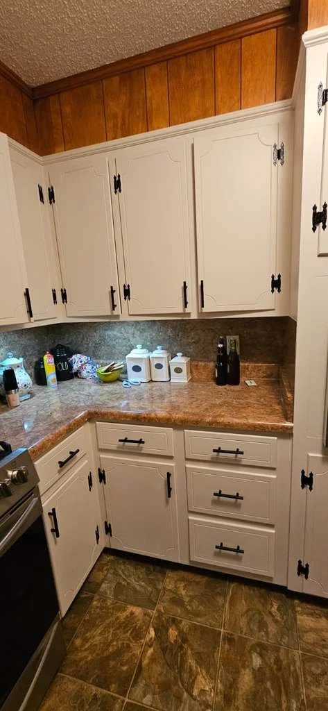 After: Kitchen Cabinets painted white in Boaz, Alabama.