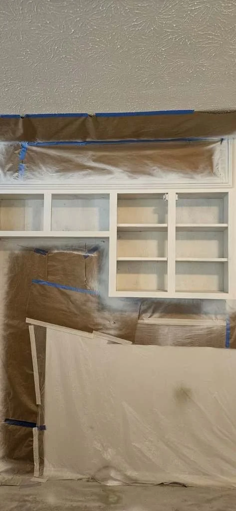 Before: Painting Cabinets in Centre, Alabama. The cabinets were being primed in this photo.
