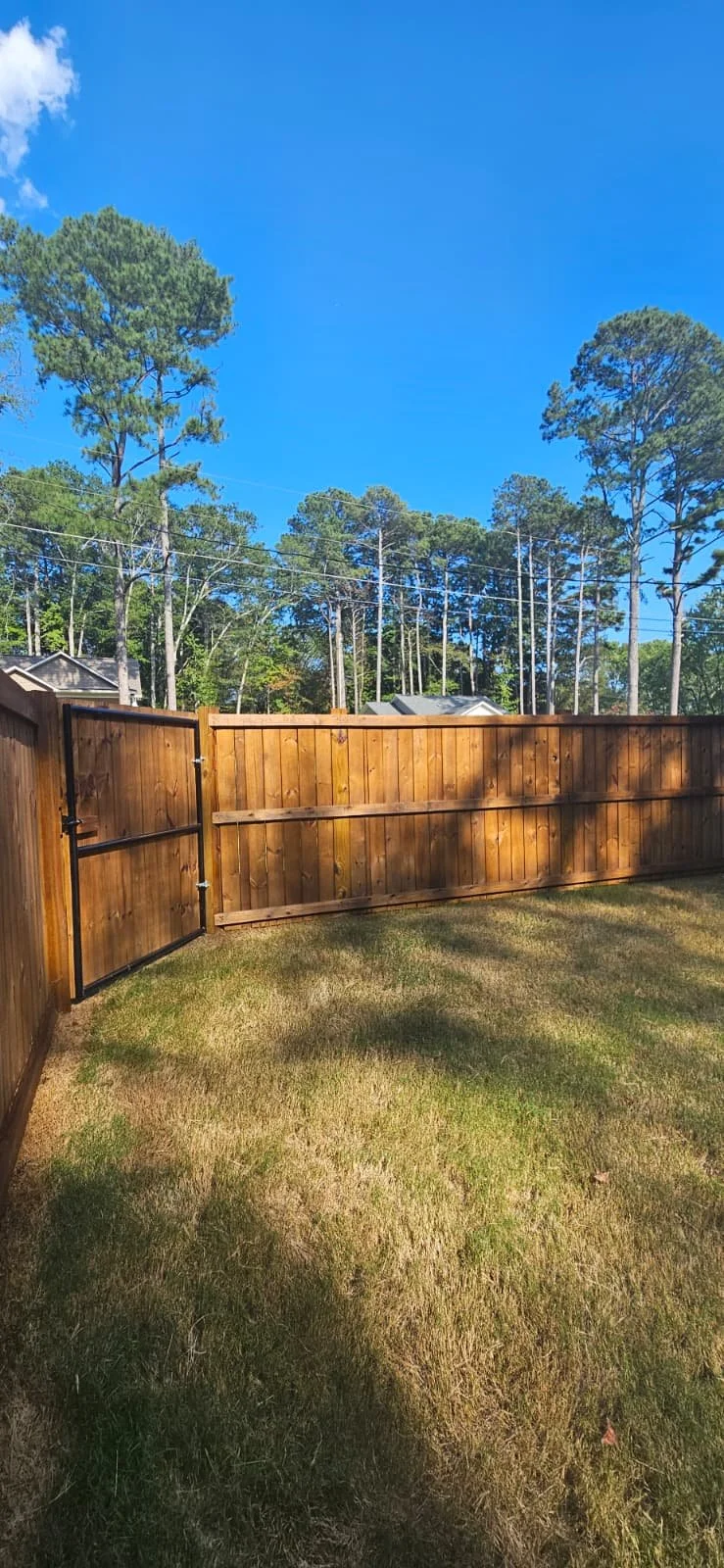 After: Fence staining in Arab, Alabama.