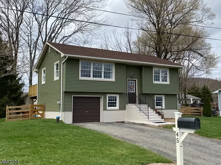 Whitney's Old House Before: Exterior Doors Were Brown & The Stairs Needed Repainting. The Mailbox Post Also Needed Fresh Paint.