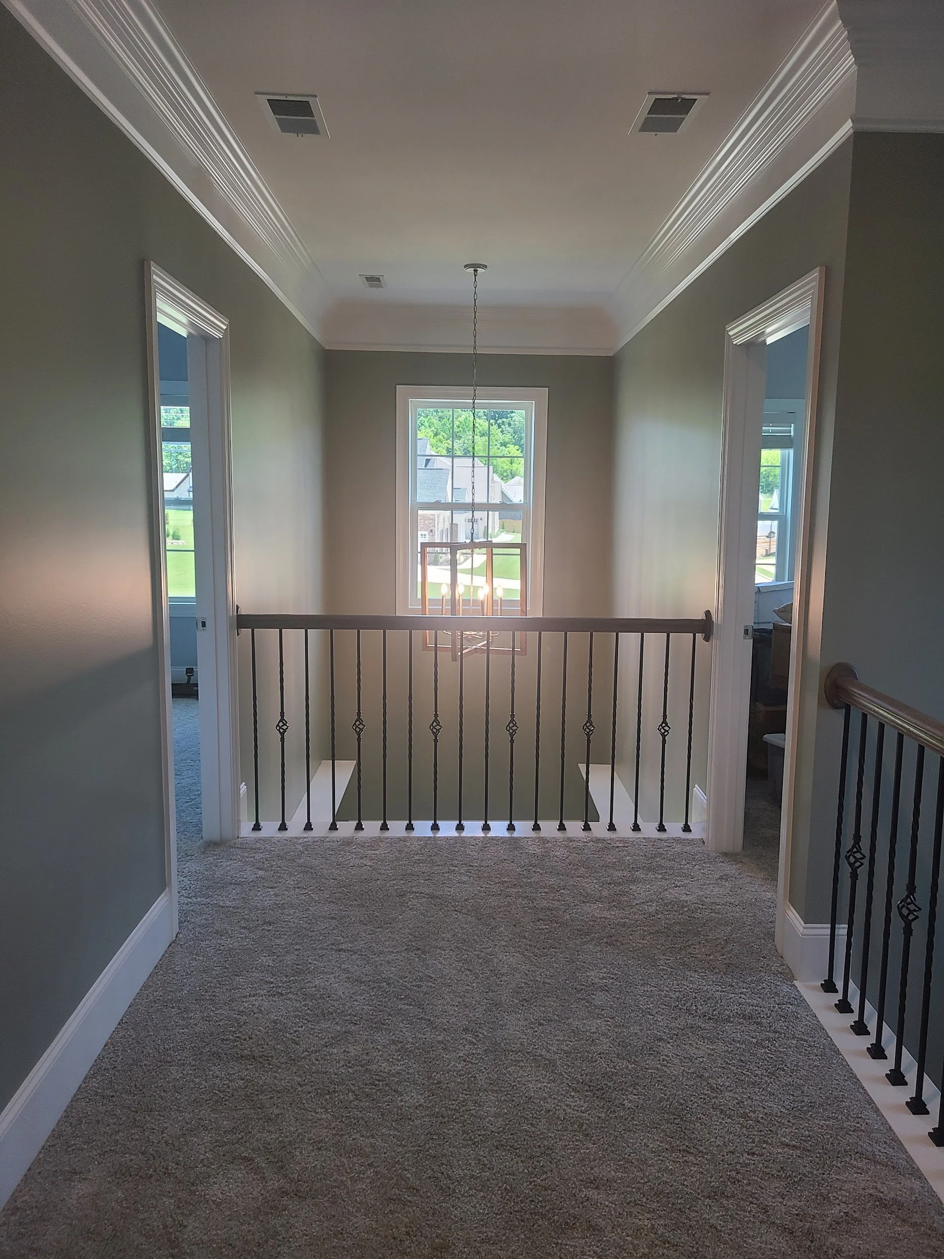 Interior painting project that included painting the upstairs landing and stairwell in Owens Cross Roads, Alabama.