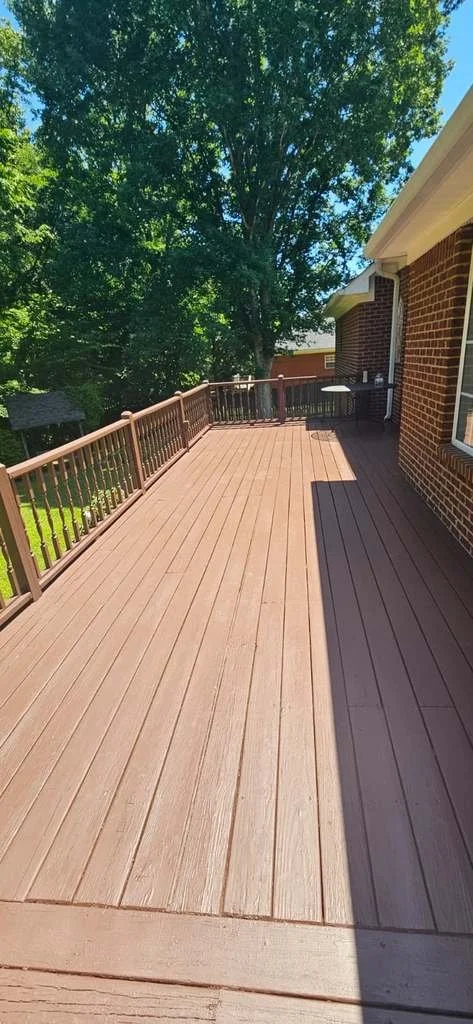 Deck painting in Albertville, Alabama.