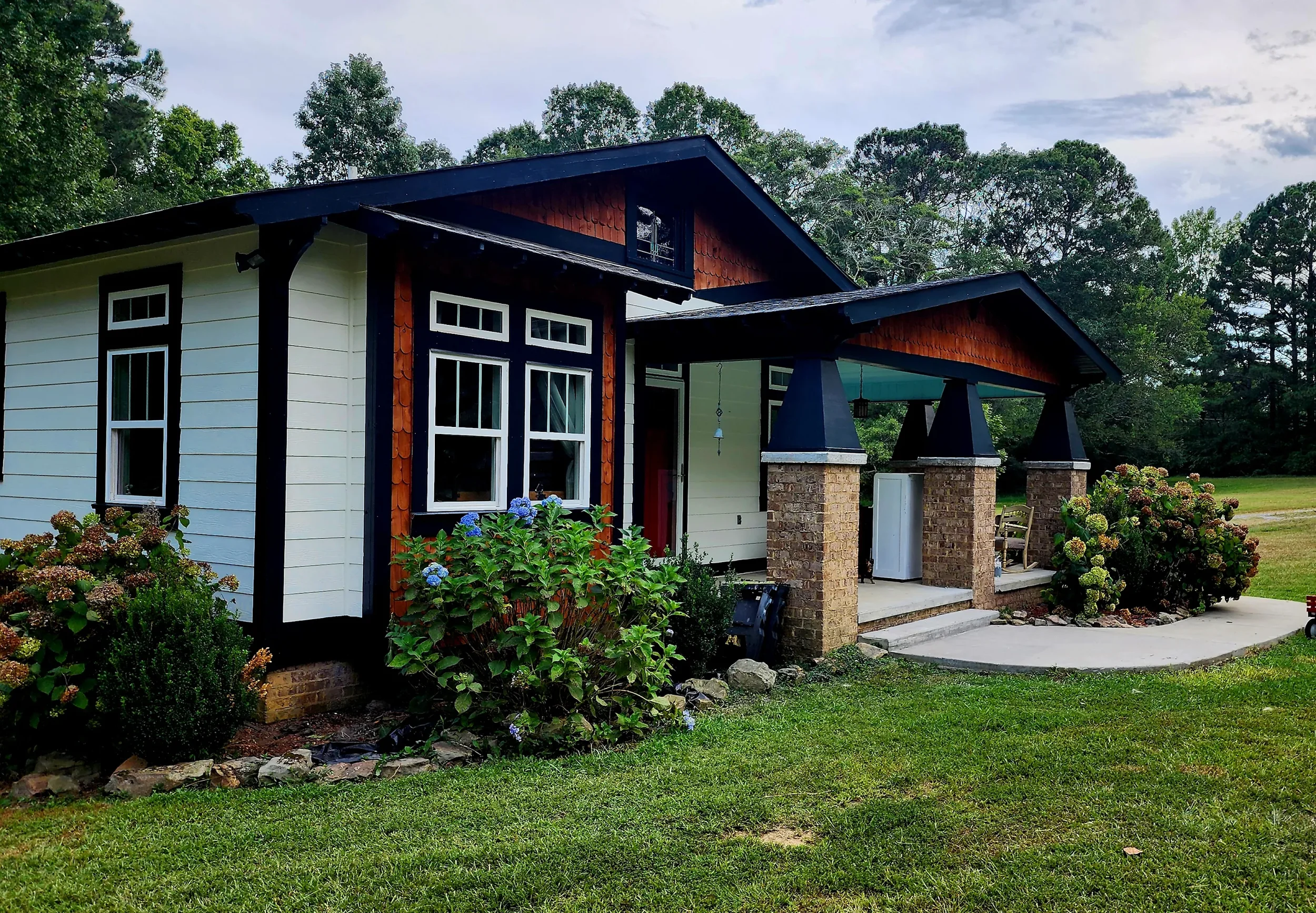 An exterior painting project with tri-color feature in Albertville, Alabama.