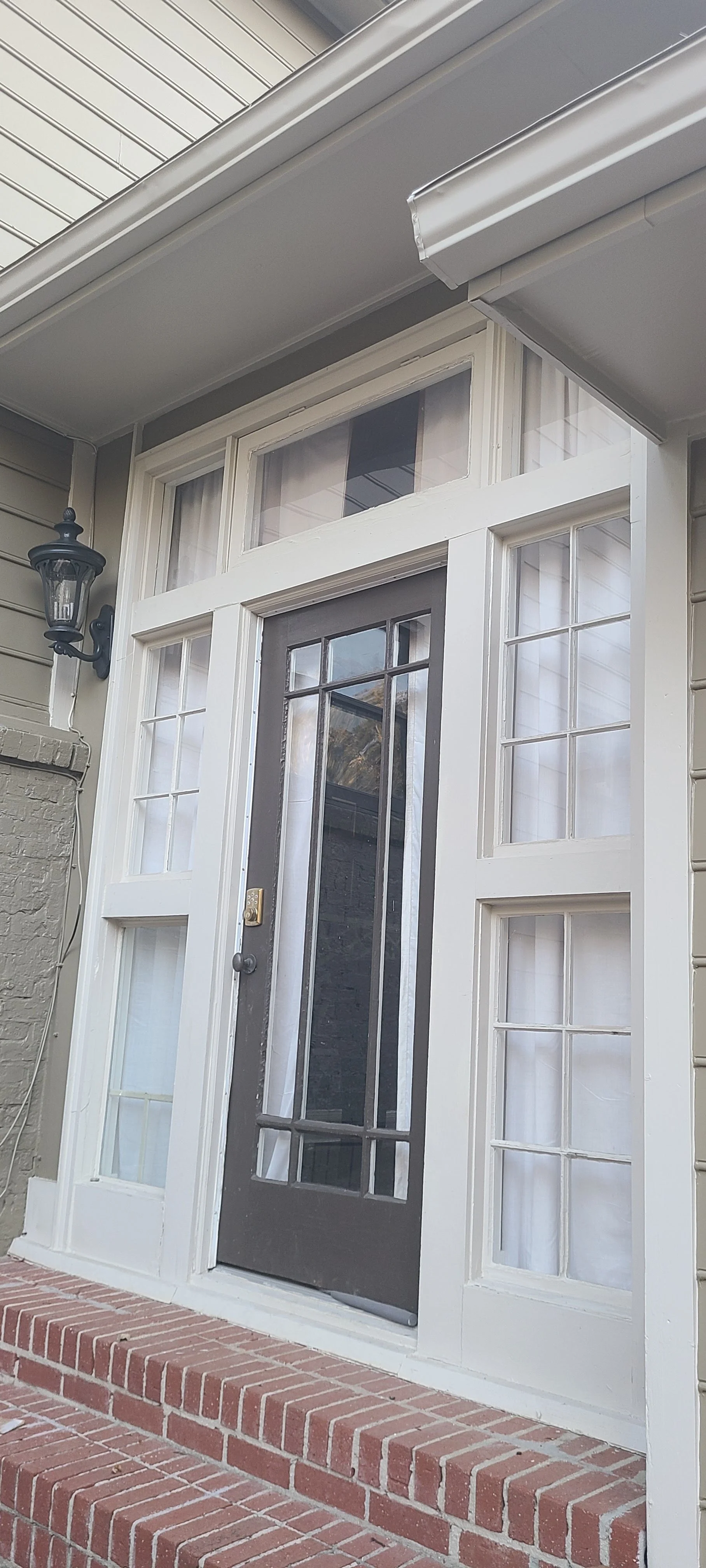 Freshly painted exterior door and trim in Huntsville, Alabama.
