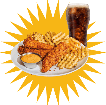Plate of fried chicken tenders with waffle fries and dipping sauce, next to a glass of soda, on a yellow starburst background.